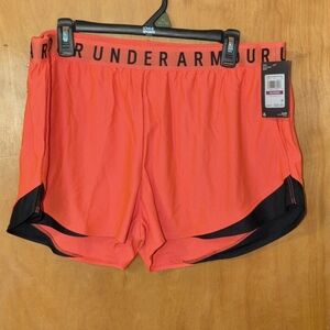Under Armour neon orange running shorts